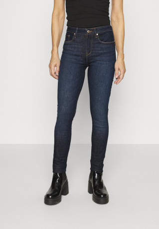 Tommy Hilfiger TH FLEX COMO SKINNY Jeans Skinny Fit izzu TH FLEX COMO SKINNY — Джинсы скинни Иззу