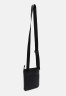 Tommy Hilfiger CENTRAL MINI CROSSOVER UNISEX Across body bag black CENTRAL MINI CROSSOVER UNISEX Сумка через плечо черный