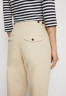 Tommy Hilfiger TAPERED PANT Chinos light sandalwood ЗАУЖЕННЫЕ БРЮКИ Брюки чинос светлое сандаловое дерево