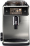 Saeco Saeco Kaffeevollautomat Xelsis Deluxe SM8785/00, fur 22 Kaffeespezialitaten, mit 8 Benutzerprofilen und 5" Touchscreen Полностью автоматическая кофемашина Saeco Xelsis Deluxe SM8785/00, для 22 сортов кофе, с 8 профилями пользователя и сенсорным экр
