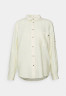 Tommy Hilfiger RELAXED LONG Button-down blouse lemon RELAXED LONG Блузка на пуговицах лимон