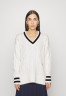 Tommy Hilfiger VARSITY CABLE Jumper ecru VARSITY CABLE перемычки экрю