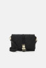 Tommy Hilfiger FLOW FLAP CROSSOVER Across body bag black FLOW FLAP CROSSOVER — Сумка через плечо черный