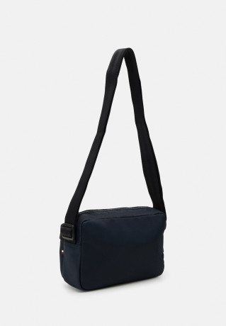 Tommy Hilfiger SKYLINE CAMERA BAG UNISEX Across body bag space blue SKYLINE CAMERA BAG UNISEX Сумка через плечо космический синий