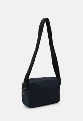 Tommy Hilfiger SKYLINE CAMERA BAG UNISEX Across body bag space blue SKYLINE CAMERA BAG UNISEX Сумка через плечо космический синий