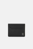 Tommy Hilfiger MODERN LEA HOLDER UNISEX Wallet black MODERN LEA HOLDER UNISEX Бумажник черный