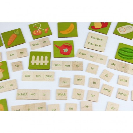 Wortbaukasten Inhalt: 60 Bildplattchen Набор для построения слов Состав: 60 плиток с картинками.