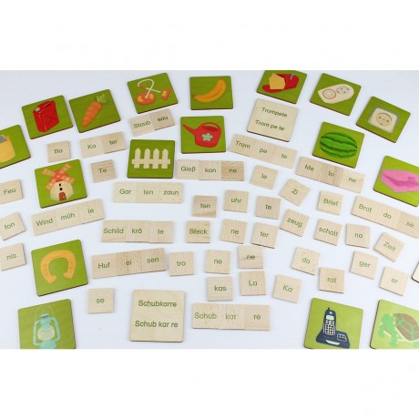 Wortbaukasten Inhalt: 60 Bildplattchen Набор для построения слов Состав: 60 плиток с картинками.