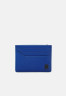 Tommy Hilfiger MODERN LEA HOLDER UNISEX Wallet ultra blue MODERN LEA HOLDER UNISEX Бумажник ультра синий