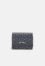 Tommy Hilfiger ICONIC MONO Wallet desert sky ICONIC MONO Кошелек небо пустыни