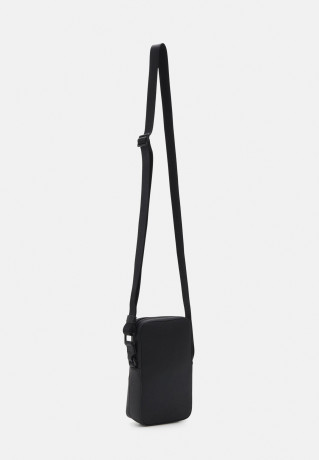 Tommy Hilfiger BUSINESS CROSSOVER UNISEX Across body bag black BUSINESS CROSSOVER UNISEX Сумка через плечо черный