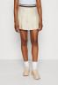Tommy Hilfiger GLOBAL PLEATED SHORT SKIRT Mini skirt classic beige КОРОТКАЯ ЮБКА GLOBAL PLEATED Мини-юбка классический бежевый