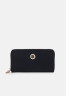 Tommy Hilfiger POPPY LARGE WALLET Wallet desert sky POPPY БОЛЬШОЙ КОШЕЛЕК Бумажник небо пустыни