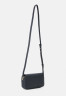 Tommy Hilfiger EMBLEM FLAP CROSSOVER Across body bag space blue EMBLEM FLAP CROSSOVER Сумка через плечо космический синий