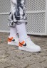 Nike Sportswear AIR FORCE 1 07 ESS SNKR Sneaker low white/black/brilliant orange AIR FORCE 1 07 ESS SNKR кроссовки женские низкие белый/черный/ярко-оранжевый