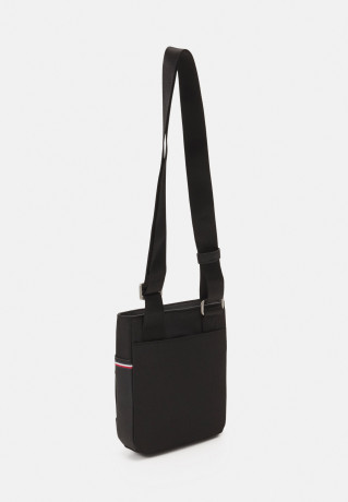 Tommy Hilfiger ELEVATED MINI CROSSOVER UNISEX Across body bag black ELEVATED MINI CROSSOVER UNISEX Сумка через плечо черный