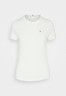 Tommy Hilfiger 1985 C NK SS Basic T-shirt ecru 1985 C NK SS — базовая футболка экрю
