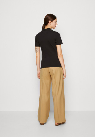 Tommy Hilfiger 1985 SLIM  Polo shirt black 1985 SLIM рубашка поло черный