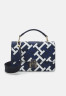 Tommy Hilfiger PUSHLOCK CROSSOVER MON Across body bag space blue PUSHLOCK CROSSOVER MON Сумка через плечо космический синий