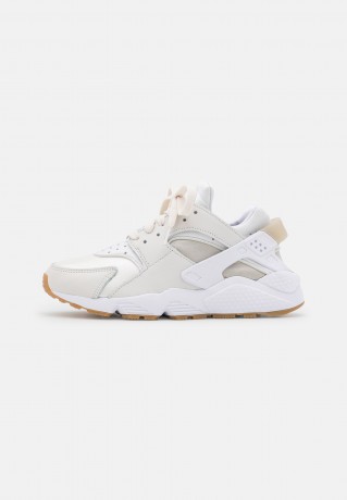 Nike Sportswear AIR HUARACHE Sneaker low phantom/white/fossil/light brown/black AIR HUARACHE Низкие кроссовки женские фантом/белый/ископаемый/светло-коричневый/черный