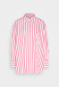 Tommy Hilfiger STRIPED ICON OVERSIZED SHIRT Button-down blouse pink/white РУБАШКА OVERSIZE STRIPED ICON Блузка на пуговицах розовый/белый
