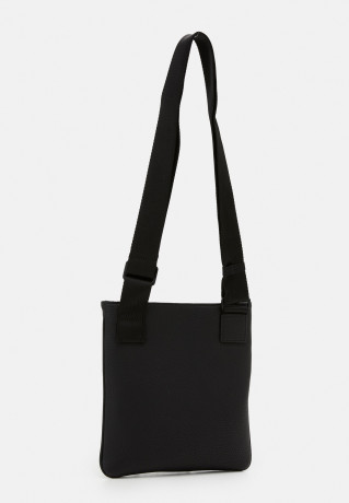 Tommy Hilfiger ESSENTIAL CROSSOVER UNISEX Across body bag black ESSENTIAL CROSSOVER UNISEX Сумка через плечо черный