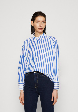 Tommy Hilfiger STRIPED ICON OVERSIZED SHIRT Button-down blouse banker ultra blue РУБАШКА OVERSIZE STRIPED ICON Блузка на пуговицах банкир ультра синий