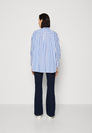 Tommy Hilfiger STRIPED ICON OVERSIZED SHIRT Button-down blouse banker ultra blue РУБАШКА OVERSIZE STRIPED ICON Блузка на пуговицах банкир ультра синий