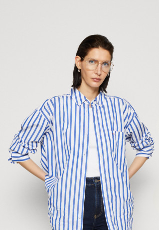 Tommy Hilfiger STRIPED ICON OVERSIZED SHIRT Button-down blouse banker ultra blue РУБАШКА OVERSIZE STRIPED ICON Блузка на пуговицах банкир ультра синий