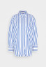 Tommy Hilfiger STRIPED ICON OVERSIZED SHIRT Button-down blouse banker ultra blue РУБАШКА OVERSIZE STRIPED ICON Блузка на пуговицах банкир ультра синий