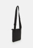 Tommy Hilfiger ESSENTIAL MINI CROSSOVER Across body bag black ESSENTIAL MINI CROSSOVER Сумка через плечо черный
