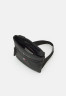 Tommy Hilfiger ESSENTIAL MINI CROSSOVER Across body bag black ESSENTIAL MINI CROSSOVER Сумка через плечо черный