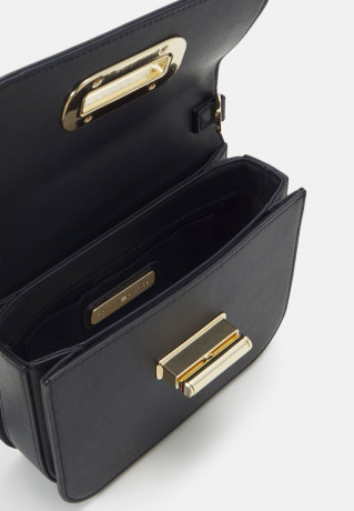 Tommy Hilfiger HERO TURNLOCK MINI CROSSOVER Across body bag space blue HERO TURNLOCK MINI CROSSOVER Сумка через плечо космический синий