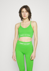 Tommy Hilfiger ESSENTIALS LOW SEAMLESS BRA Light support sports bra spring lime ESSENTIALS LOW SEAMLESS BRA Спортивный бюстгальтер с легкой поддержкой весенняя известь