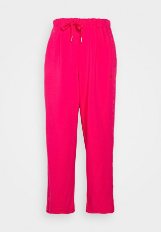 Tommy Hilfiger RELAXED INTERLOCKPANT Tracksuit bottoms pink splendor RELAXED INTERLOCKPANT Спортивные штаны розовое великолепие