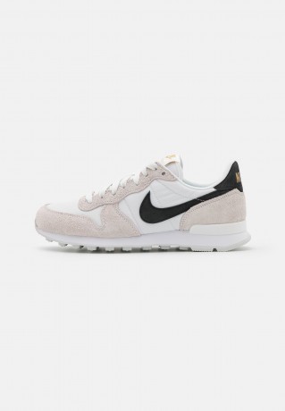 Nike Sportswear NIKE INTERNATIONALIST DAMENSCHUH Sneaker low summit white/black/metallic gold/white ЖЕНСКАЯ ОБУВЬ NIKE INTERNATIONALIST — Низкие кроссовки женские вершина белый/черный/золотой металлик/белый