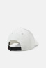 Tommy Hilfiger SURPLUS UNISEX Cap ivory SURPLUS УНИСЕКС Кепка слоновая кость