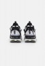 Nike Sportswear AIR MAX FURYOSA Sneaker low black/summit white AIR MAX FURYOSA — Низкие кроссовки женские черный/высокобелый