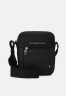 Tommy Hilfiger MINI REPORTER Across body bag black MINI REPORTER Сумка через плечо черный