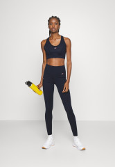 Tommy Hilfiger MID SORONA MIX BRA Medium support sports bra desert sky MID SORONA MIX BRA Спортивный бюстгальтер со средней поддержкой небо пустыни