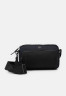 Tommy Hilfiger CITY COMMUTER Across body bag space blue CITY COMMUTER Сумка через плечо космический синий
