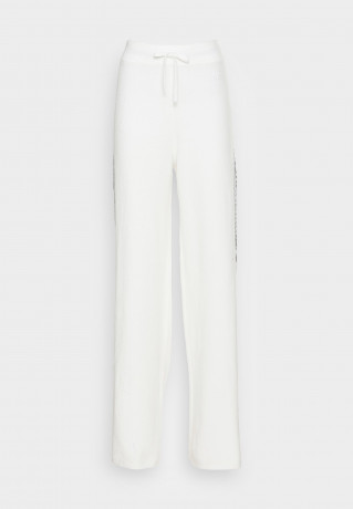Tommy Hilfiger FLEX WIDE LEG PANT Tracksuit bottoms ecru FLEX WIDE LEG PANT Брюки от спортивного костюма экрю