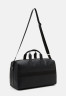 Tommy Hilfiger CENTRAL DUFFLE UNISEX Weekend bag black CENTRAL DUFFLE UNISEX Сумка выходного дня черный
