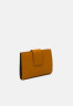 Tommy Hilfiger OUTLINE FLAP Wallet crest gold-coloured OUTLINE FLAP Бумажник гребень золотистого цвета