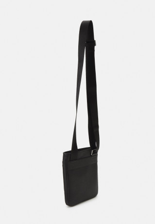 Tommy Hilfiger CENTRAL MINI CROSSOVER UNISEX Across body bag black CENTRAL MINI CROSSOVER UNISEX Сумка через плечо черный
