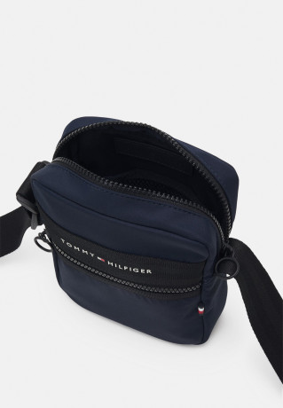 Tommy Hilfiger HORIZON MINI REPORTER UNISEX Across body bag space blue HORIZON MINI REPORTER UNISEX Сумка через плечо космический синий