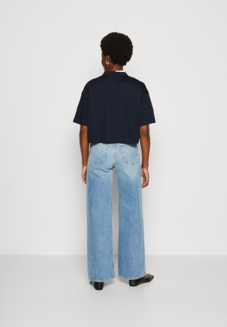 Tommy Hilfiger RLX SPLIT GLOBAL STR CROP Polo shirt desert sky RLX SPLIT GLOBAL STR CROP Рубашка поло небо пустыни