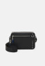 Tommy Hilfiger TH BUSINESS LEATHER CAMERA BAG Across body bag black TH BUSINESS LEATHER CAMERA BAG Сумка через плечо черный