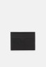 Tommy Hilfiger CENTRAL HOLDER UNISEX Wallet black ЦЕНТРАЛЬНЫЙ ДЕРЖАТЕЛЬ УНИСЕКС Бумажник черный