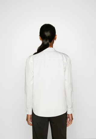 Tommy Hilfiger TONE FRILL RGL Button-down blouse ecru TONE FRILL RGL Блузка на пуговицах экрю